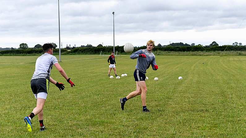 10 June 2020; Kevin Feely during a training session with his Athy and Kildare team-mates David Hyland, left, and Niall Kelly at a community pitch in Athy, Kildare. Following restrictions imposed by the Irish Government and the Health Service Executive in an effort to contain the spread of the Coronavirus (COVID-19) pandemic, all GAA facilities closed on March 25. Pitches are due to fully open to club members for training on June 29, and club matches provisionally due to start on July 31 with intercounty matches due to to take place no sooner that October 17. Photo by Piaras O Midheach/Sportsfile