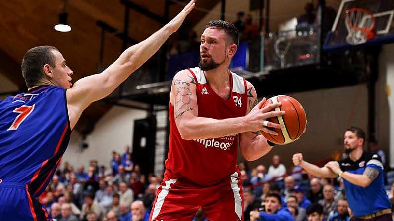 25 January 2020; Jason Killeen of Griffith College Templeogue in action against Stefan Zecevic of DBS Eanna during the Hula Hoops Pat Duffy National Cup Final between DBS Eanna and Griffith College Templeogue at the National Basketball Arena in Tallaght, Dublin. Photo by Brendan Moran/Sportsfile