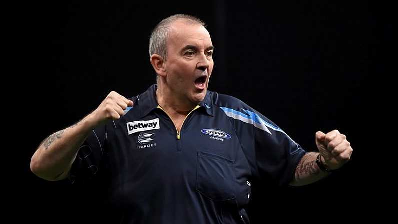 26 March 2015; Phil Taylor competes against Kim Huybrechts during the Betway Premier League Darts at the 3Arena, Dublin. Picture credit: Stephen McCarthy / SPORTSFILE