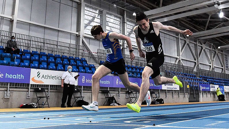 20 February 2021; Mark English of Finn Valley AC, Donegal, right, dips for the line to win the Men's 800m, ahead of Cian McPhillips of Longford AC,  left, who finished second, during day one of the Irish Life Health Elite Athlete Indoor Micro Meet at Sport Ireland National Indoor Arena at the Sport Ireland Campus in Dublin. Photo by Sam Barnes/Sportsfile