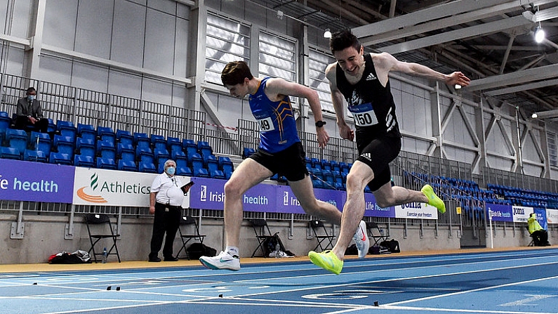 20 February 2021; Mark English of Finn Valley AC, Donegal, right, dips for the line to win the Men's 800m, ahead of Cian McPhillips of Longford AC,  left, who finished second, during day one of the Irish Life Health Elite Athlete Indoor Micro Meet at Sport Ireland National Indoor Arena at the Sport Ireland Campus in Dublin. Photo by Sam Barnes/Sportsfile