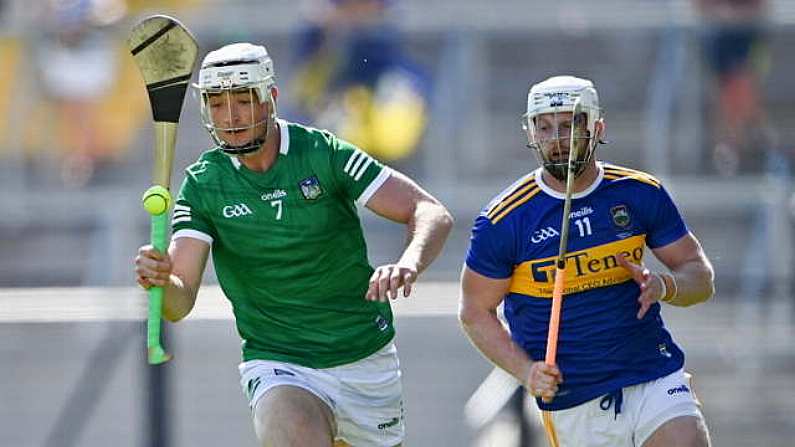 18 July 2021; Kyle Hayes of Limerick gets past Michael Breen of Tipperary during the Munster GAA Hurling Senior Championship Final match between Limerick and Tipperary at Pairc Ui Chaoimh in Cork. Photo by Piaras O Midheach/Sportsfile