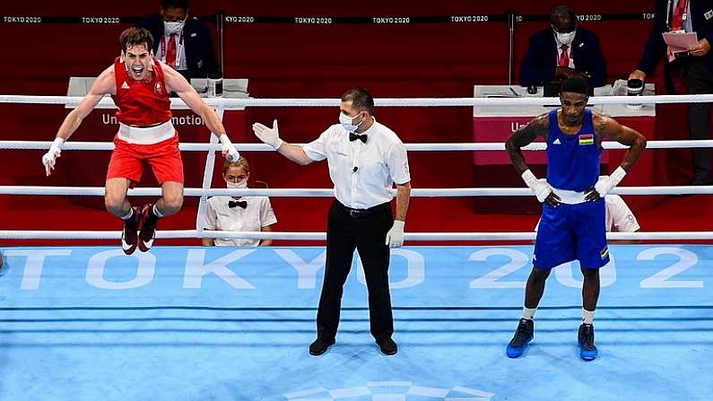 30 July 2021; Aidan Walsh of Ireland is declared victorious over Merven Clair of Mauritius by referee Mansur Muhiddinov following their men's welterweight quarter-final bout at the Kokugikan Arena during the 2020 Tokyo Summer Olympic Games in Tokyo, Japan. Photo by Stephen McCarthy/Sportsfile