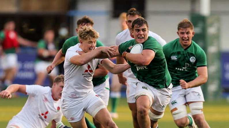 1 July 2021; Alex Kendellen of Ireland breaks away from Fin Smith of England during the U20 Guinness Six Nations Rugby Championship match between Ireland and England at Cardiff Arms Park in Cardiff, Wales. Photo by Gareth Everett/Sportsfile