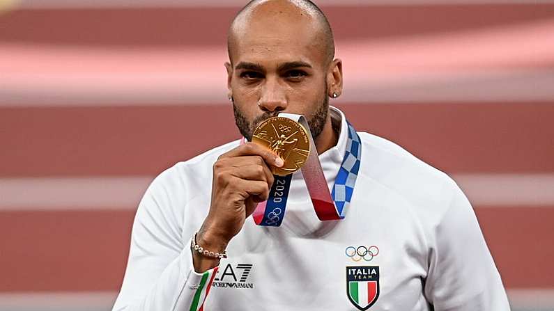 2 August 2021; Gold medalist Lamont Marcell Jacobs of Italy on the podium during the Men's 100 metre Victory Ceremony at the Olympic Stadium on day ten of the 2020 Tokyo Summer Olympic Games in Tokyo, Japan. Photo by Ramsey Cardy/Sportsfile