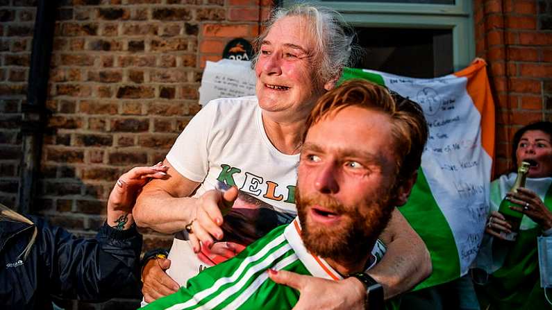 8 August 2021; Kellie Harrington's mother Yvonne and brother Chirstopher celebrate after her Tokyo 2020 Olympics lightweight final bout, against Beatriz Ferreira of Brazil, from home at Portland Row in Dublin. Photo by Ray McManus/Sportsfile