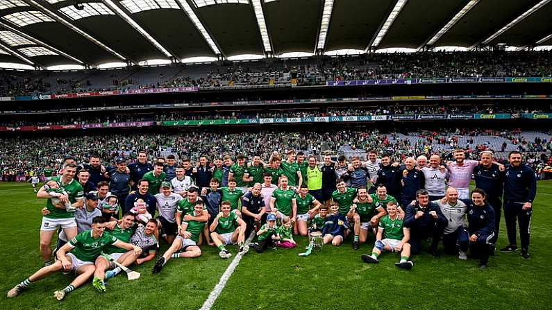 22 August 2021; Limerick players and staff celebrate with the Liam MacCarthy Cup after the GAA Hurling All-Ireland Senior Championship Final match between Cork and Limerick in Croke Park, Dublin. Photo by Stephen McCarthy/Sportsfile