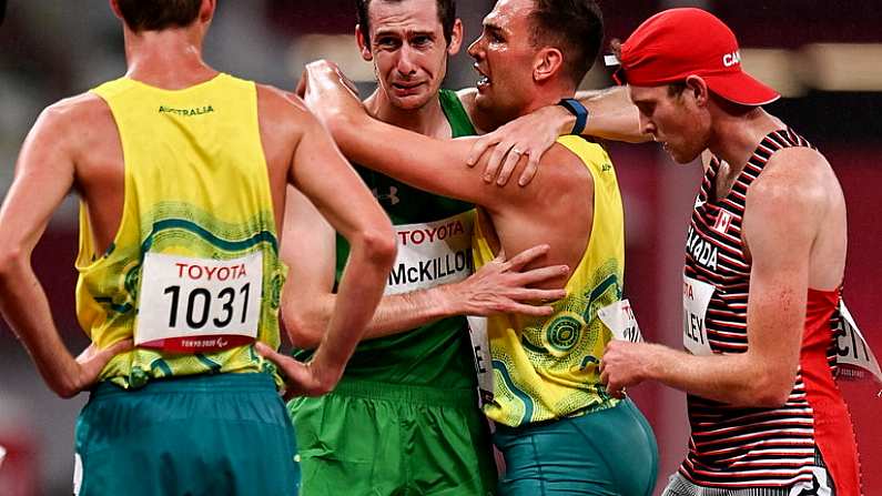 4 September 2021; Michael McKillop of Ireland, centre, is consoled by competitors after competing in the Men's T38 1500 metre final at the Olympic Stadium on day eleven during the Tokyo 2020 Paralympic Games in Tokyo, Japan. Photo by Sam Barnes/Sportsfile