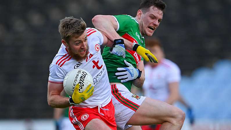 25 October 2020; Michael O'Neill of Tyrone in action against Matthew Ruane of Mayo during the Allianz Football League Division 1 Round 7 match between Mayo and Tyrone at Elverys MacHale Park in Castlebar, Mayo. Photo by Piaras O Midheach/Sportsfile