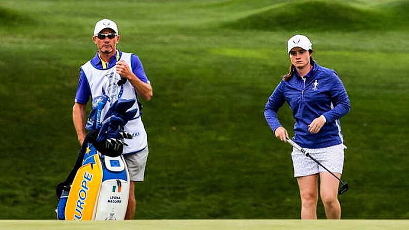 4 September 2021; Leona Maguire of Team Europe with her caddie Dermot Byrne on the first green during the morning foursomes match with team-mate Mel Reid against Nelly Korda and Jessica Korda of Team USA on day one of the Solheim Cup at the Inverness Club in Toledo, Ohio, USA. Photo by Brian Spurlock/Sportsfile