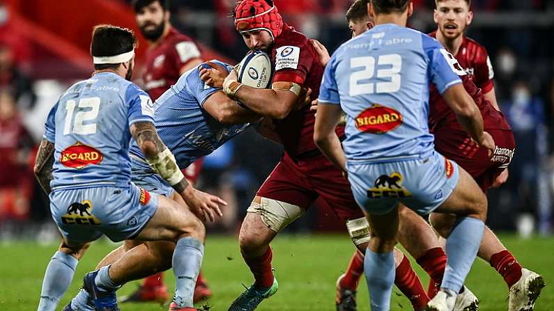 18 December 2021; Josh Wycherley of Munster is tackled by Kevin Kornath of Castres Olympique during the Heineken Champions Cup Pool B match between Munster and Castres Olympique at Thomond Park in Limerick. Photo by David Fitzgerald/Sportsfile