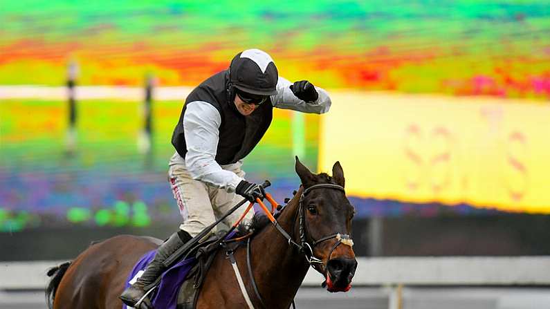 28 December 2020; Jockey Jonathan Moore celebrates as he passes the post after riding Flooring Porter to victory in the Leopardstown Christmas Hurdle on day three of the Leopardstown Christmas Festival at Leopardstown Racecourse in Dublin. Photo by Seb Daly/Sportsfile