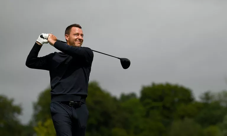 Former footballer John Terry watches his drive from the 2nd tee box during day two of the JP McManus Pro-Am at Adare Manor Golf Club