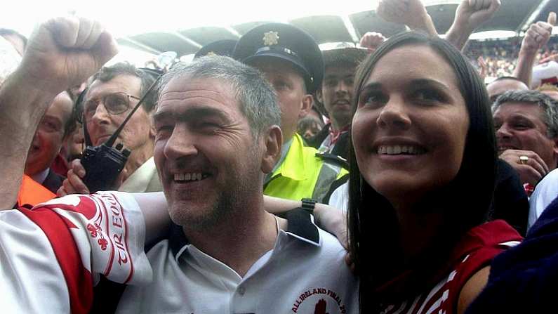 28 September 2003; Tyrone manager Mickey Harte celebrates at the end of the game with his daughter Michaela after victory over Armagh. Bank of Ireland All-Ireland Senior Football Championship Final, Armagh v Tyrone, Croke Park, Dublin. Picture credit; David Maher  / SPORTSFILE