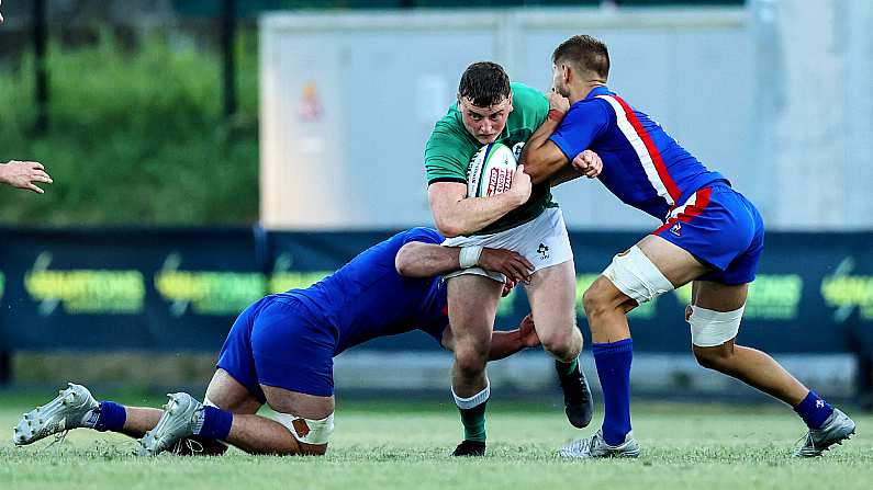 Under-20 Six Nations Summer Series Round 1 Pool A, Payanini Center, Verona, Italy 24/6/2022 France vs Ireland Ireland's Fionn Gibbons is tackled  Mandatory Credit INPHO/Ben Brady