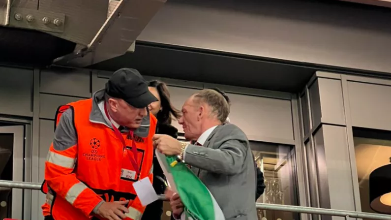 Liverpool Fan Apparently Forced To Remove Celtic Flag In Rangers Game