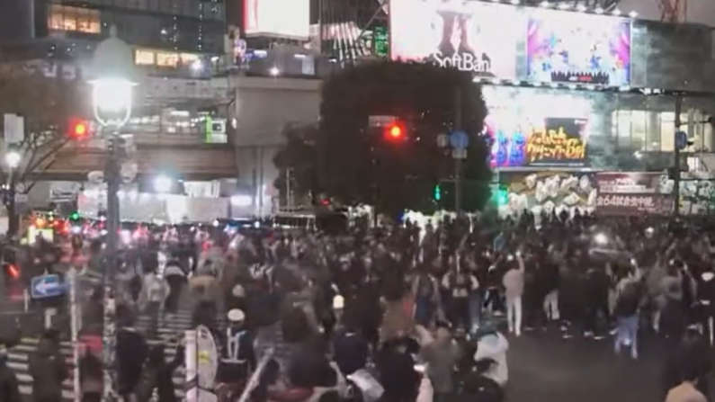 Respectful Scenes In Tokyo As Celebrating Japanese Fans Obey Traffic Cops