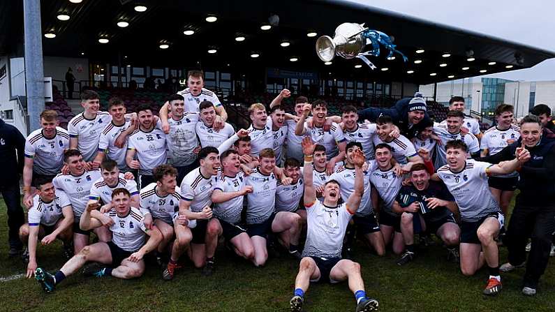 19 February 2022; University of Limerick captain Bryan O'Mara lifts the Fitzgibbon Cup as his teammates celebrate after the Electric Ireland HE GAA Fitzgibbon Cup Final match between NUI Galway and University of Limerick at IT Carlow in Carlow. Photo by Matt Browne/Sportsfile