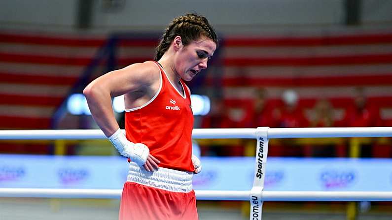 11 March 2024; Grainne Walsh of Ireland reacts after her defeat against Aneta Rygielska of Poland in her Women's 66kg Quarterfinals bout during day nine at the Paris 2024 Olympic Boxing Qualification Tournament at E-Work Arena in Busto Arsizio, Italy. Photo by Ben McShane/Sportsfile