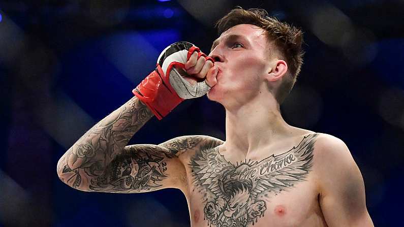 16 December 2016; Rhys McKee celebrates defeating Jai Herbert during their Lonsdale Lightweight Title bout at BAMMA 27 in the 3 Arena in Dublin. Photo by Ramsey Cardy/Sportsfile