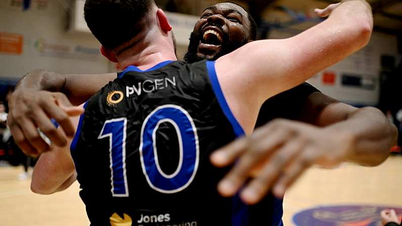 5 January 2024; Elijah Tillmanof UCC Demons celebrates with David Lehane after the Basketball Ireland Pat Duffy National Cup semi-final match between Energywise Ireland Neptune and UCC Demons at Neptune Stadium in Cork.  Photo by Eoin Noonan/Sportsfile