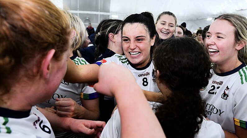 11 February 2024; University of Limerick players including Ailbhe Larkin, centre, celebrate after  their side's victory in the Electric Ireland Ashbourne Cup final match between University of Limerick and Technological University Dublin at University of Galway Connacht GAA AirDome in Bekan, Mayo. Photo by Sam Barnes/Sportsfile