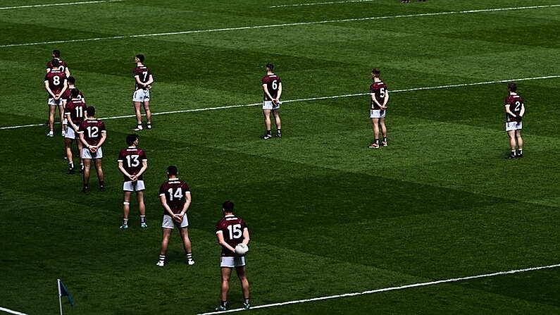 14 July 2024; Galway players stand for a minute's silence for the late John O'Mahony, former Galway, Mayo and Leitrim senior football manager, before the GAA Football All-Ireland Senior Championship semi-final match between Donegal and Galway at Croke Park in Dublin. Photo by Piaras O Midheach/Sportsfile