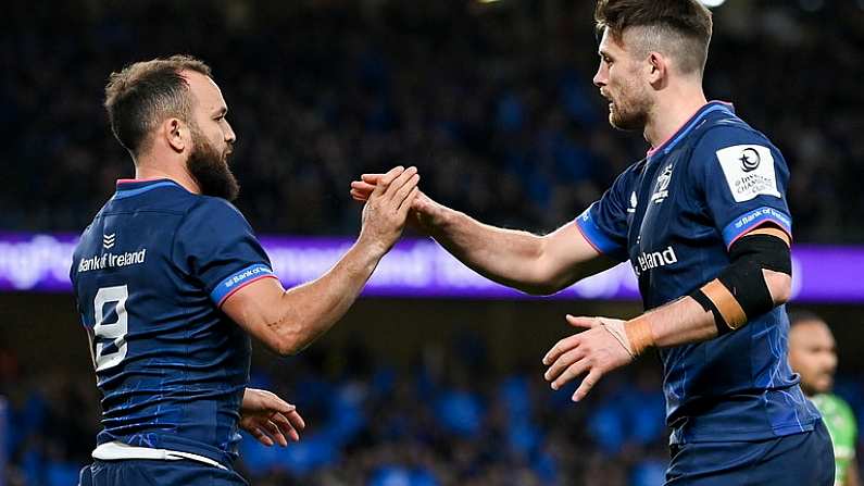 6 April 2024; Jamison Gibson-Park of Leinster, left, celebrates with teammate Ross Byrne after scoring their side's second try during the Investec Champions Cup Round of 16 match between Leinster and Leicester Tigers at the Aviva Stadium in Dublin. Photo by Seb Daly/Sportsfile