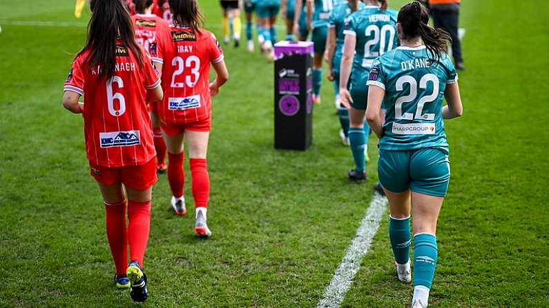 13 April 2024; Shelbourne and Shamrock Rovers players take to the pitch before the SSE Airtricity Women's Premier Division match between Shelbourne and Shamrock Rovers at Tolka Park in Dublin. Photo by Stephen McCarthy/Sportsfile