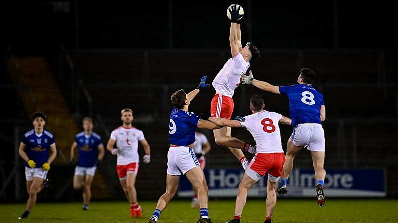 11 January 2022; Joe Oguz of Tyrone, centre, in action against Killian Clarke, left, and James Smith of Cavan during the Dr McKenna Cup round 2 match between Cavan and Tyrone at Kingspan Breffni in Cavan. Photo by Seb Daly/Sportsfile