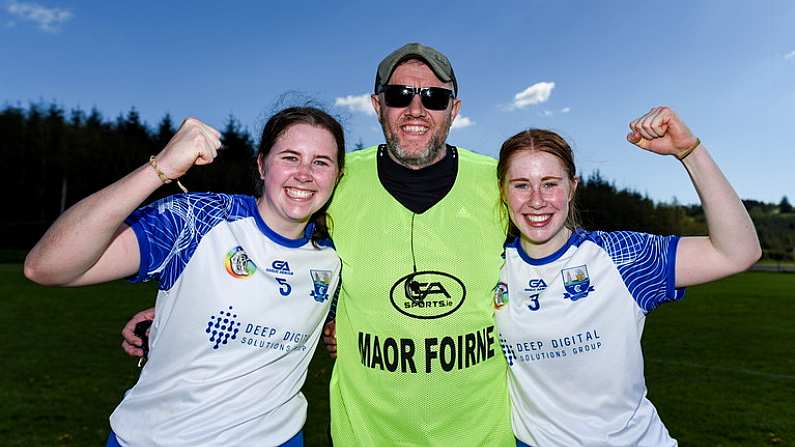 21 April 2024; Waterford players, Katie O'Neill, left, and Anna McGoldrick celebrate with coach Shane Dunphy after the Electric Ireland All-Ireland Camogie Minor A semi-final match between Cork and Waterford at Kilcommon in Tipperary. Photo by Tom Beary/Sportsfile