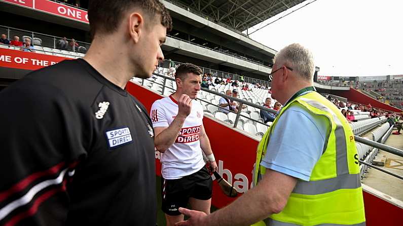 11 May 2024; Patrick Horgan of Cork is prevented from walking on the pitch, due to carrying a hurley, before the Munster GAA Hurling Senior Championship Round 3 match between Cork and Limerick at SuperValu Pairc Ui Chaoimh in Cork. Photo by Stephen McCarthy/Sportsfile