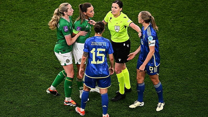 31 May 2024; Katie McCabe of Republic of Ireland, second from left, and Magdalena Eriksson of Sweden, right, are seperated by referee Katalin Kulcsar during the 2025 UEFA Women's European Championship qualifying match between Republic of Ireland and Sweden at Aviva Stadium in Dublin. Photo by Seb Daly/Sportsfile