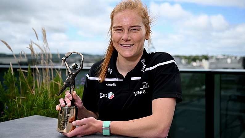 27 June 2024; PwC GPA Player of the Month for April in camogie, Beth Carton of Waterford, with her award at PwCs offices in Cork. Photo by Seb Daly/Sportsfile