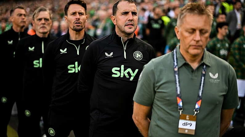 7 September 2024; Republic of Ireland assistant head coach John O'Shea, second from right, head coach Heimir Hallgrimsson, right, and assistant coach Paddy McCarthy stand for the playing of the National Anthem before the UEFA Nations League B Group 2 match between Republic of Ireland and England at Aviva Stadium in Dublin. Photo by Stephen McCarthy/Sportsfile