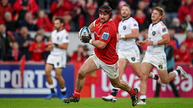 21 October 2023; Diarmuid Barron of Munster on his way to scoring his side's second try during the United Rugby Championship match between Munster and Hollywoodbets Sharks at Thomond Park in Limerick. Photo by Seb Daly/Sportsfile