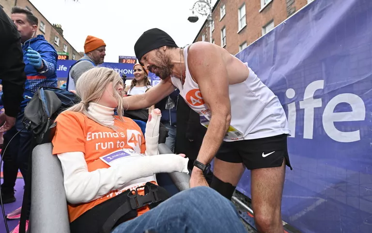 Colin Farrell and Emma Fogarty at the 2024 Dublin Marathon Finish Line