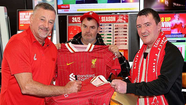 Liverpool FC and Republic of Ireland legend John Aldridge as he surprised  lucky fans Mark Kenny and Darren Bevins when he presented them with an all expenses trip to Anfield to support the team against Fulham on 14th December at Ladbrokes betting shop, Wexford Street, Dublin. The surprise and delight comes as Ladbrokes was recently announced as the official betting partner with Liverpool FC in Ireland and the UK, a multi-year deal which will provide Ladbrokes with a range of exclusive content opportunities and activations to reward and entertain Liverpool's loyal fan base.
Picture Brian McEvoy 
No Repro fee for one use