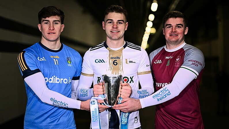 11 December 2024; Footballers, from left, Daire Cregg of UCD, Ryan Magill of University of Ulster and Colin Murray of University of Galway with the Sigerson Cup before the draw for the Electric Ireland GAA Higher Education Championships at Croke Park in Dublin. Photo by Piaras O Midheach/Sportsfile