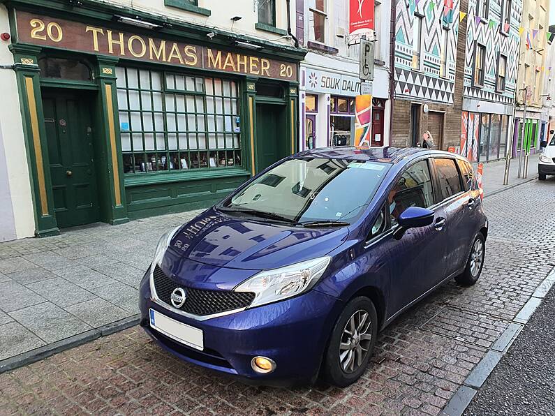 Gardaí fine driver for parking in disabled bay outside iconic Waterford pub