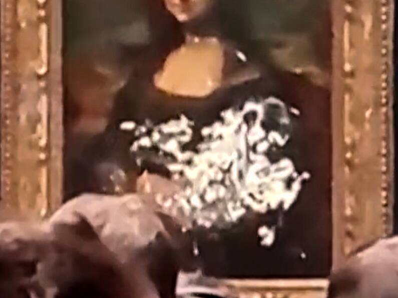 The Mona Lisa has been smeared in cream in protest