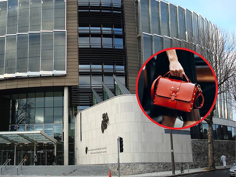 Woman dragged 30 metres along road during handbag robbery, court hears