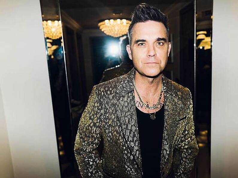 Robbie Williams reveals he had a hitman after him