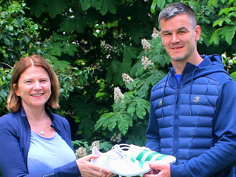 Sexton’s boots from historic 100th cap raffled for charity