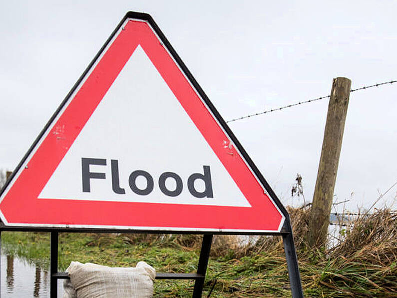 Firefighters rescue people from cars and homes amid floods in Derry