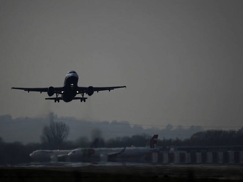 Man arrested for opening plane door during flight