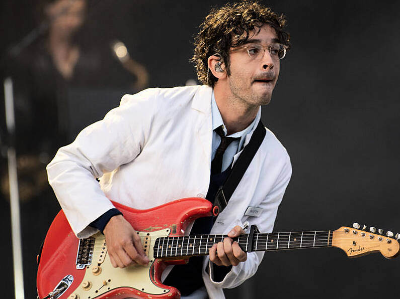 Matty Healy arrives at Trnsmt headline set in red wheelie bin