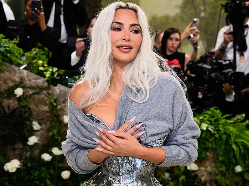 Kim Kardashian says she finds her voice distinct and annoying