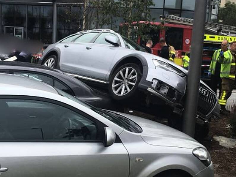 Woman knocked down outside Dublin shopping centre remains in hospital