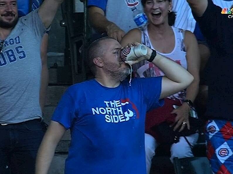 Baseball fan catches foul ball in his beer cup, proceeds to chug